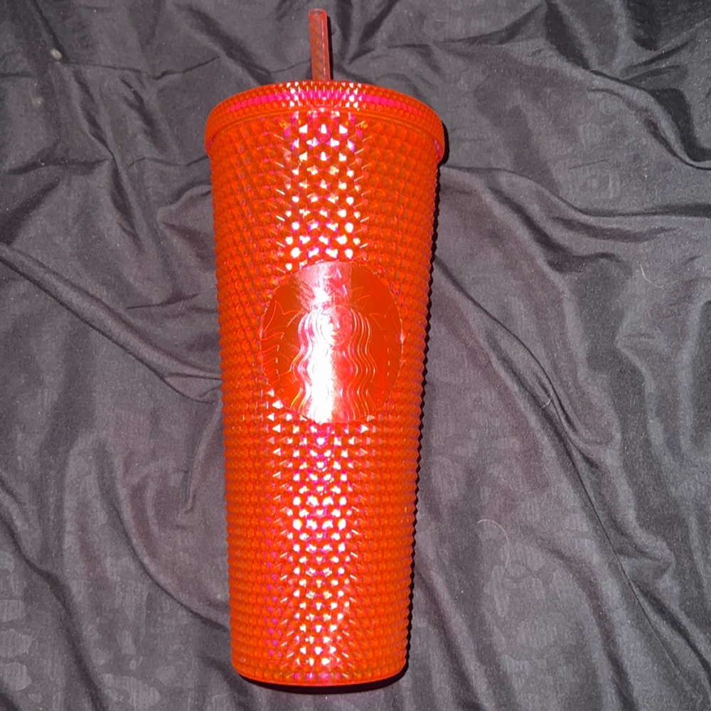 Pink studded Starbucks cup